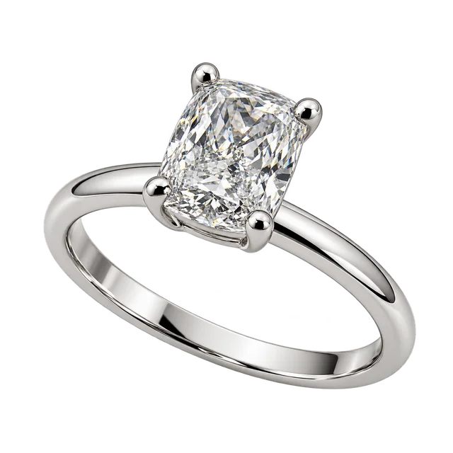 Essential PS Solitaire Ring with an elongated rounded rectangular centre diamond, four corner claws and a plain band