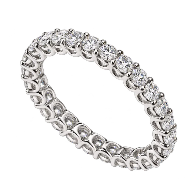 Giro Vanity Diamond Ring with a continuous row of round diamonds in open prong baskets