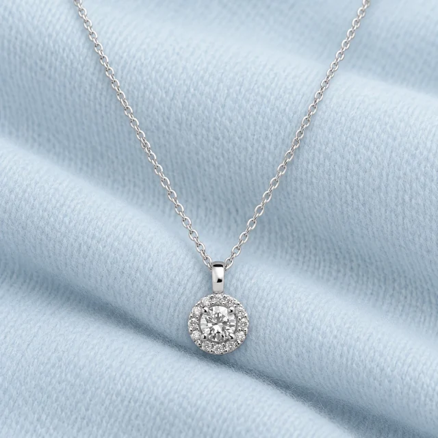 Jennifer Pendant on softly folded pale ice-blue cashmere