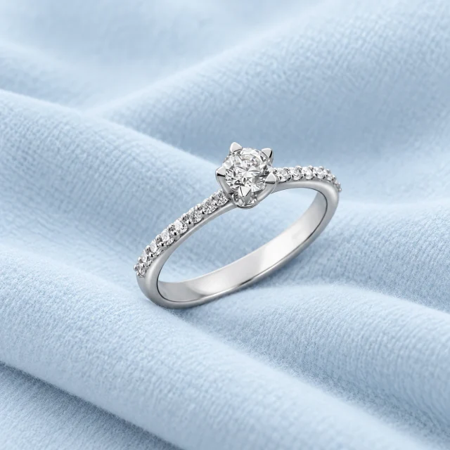Royal Pavé Solitaire on pale ice-blue cashmere